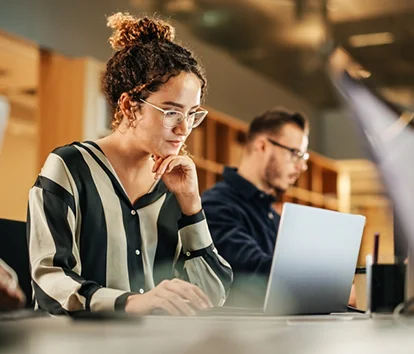 a woman using a laptop